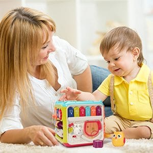 Resigilat - Jucarie Interactiva pentru Bebelusi, Cub Activitati 6 in 1, Muzica si Lumini, Multifunctional, 20x20x20 cm, + 3 Luni - LUDIRO