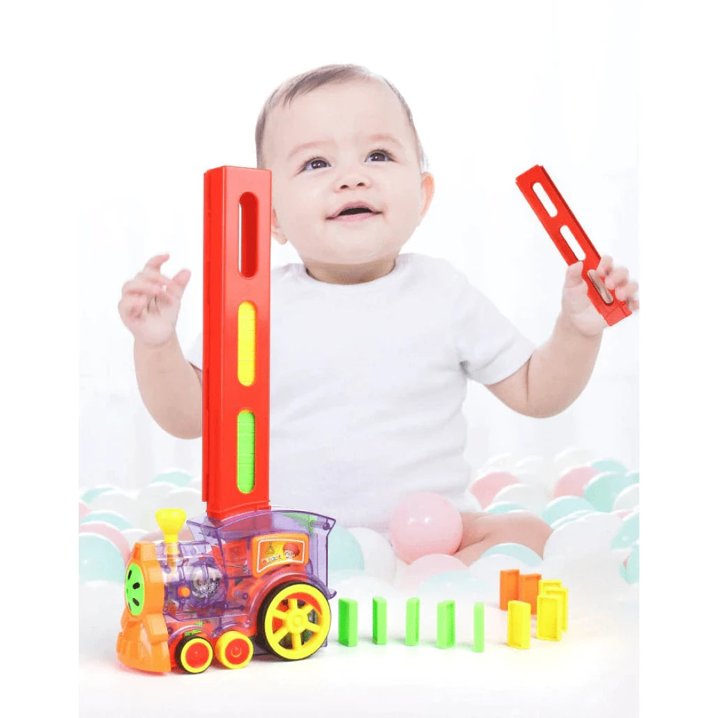 Set Trenulet Electric cu 50 de Piese Domino pentru Stivuire, cu Lumini Si Sunete Interactive, + 3 Ani, 16x7x33 Cm - LUDIRO