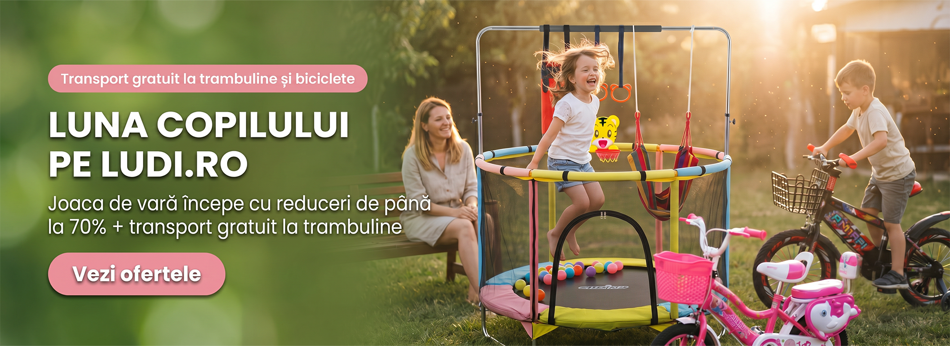 Banner promoțional Ludi.ro pentru Luna Copilului, cu o fetiță care se joacă fericită într-o trambulină colorată și un băiețel pe bicicletă, într-un cadru de grădină vara. Imaginea anunță reduceri de până la 70% și transport gratuit la trambuline și biciclete.