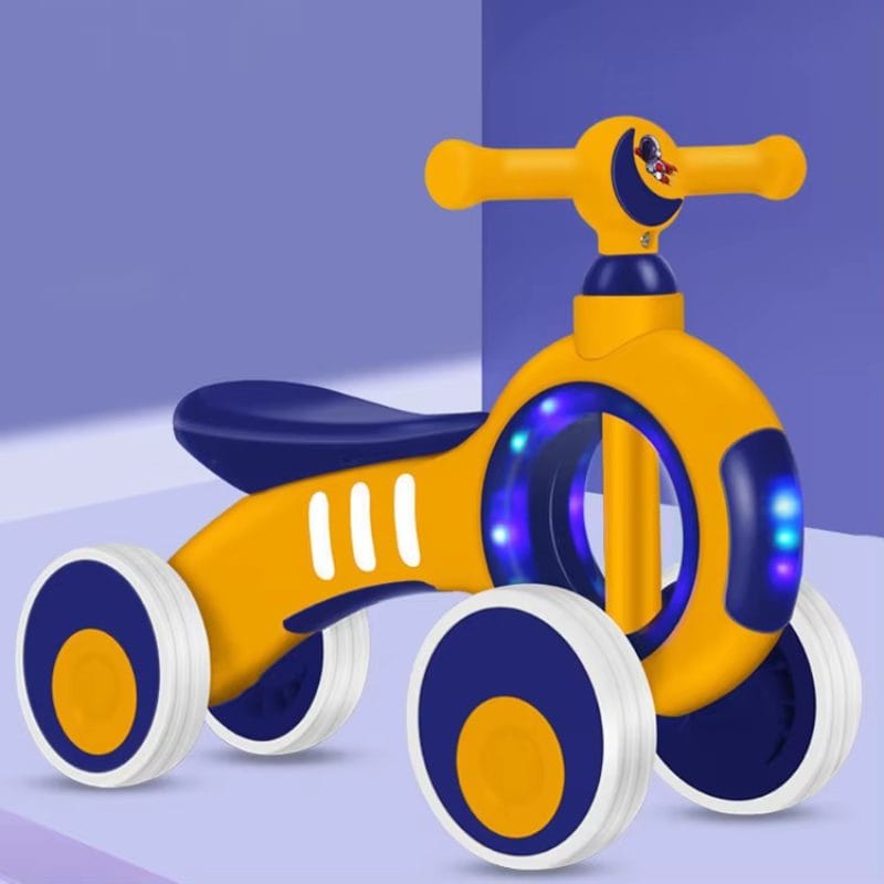 Bicicleta de Echilibru fara Pedale LUDIRO 2 in 1, 4 Roti Antialunecare, Structura Stabila, Margini Rotunjite, Lumini Colorate si Sunete Interactive, Sustine Dezvoltarea Timpurie, Galben Albastru, + 2 Ani - LUDIRO