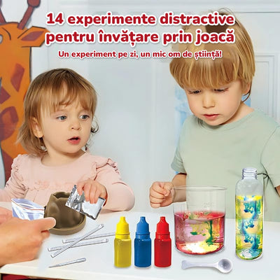 Doi copii privesc paharul cu ploaie colorată și coloranții din kit, sub titlul 14 experimente distractive