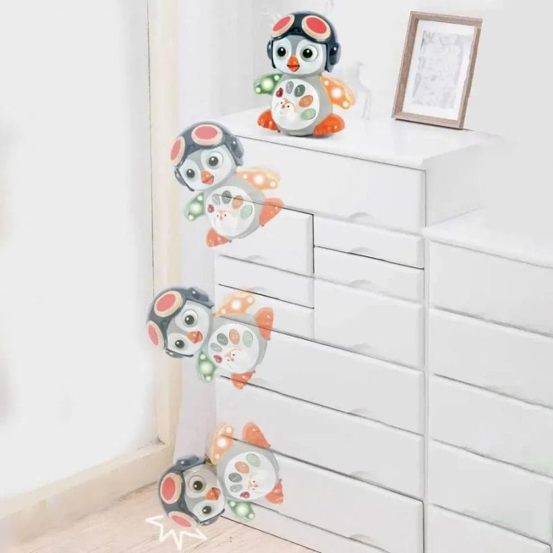 Colaj de prezentare a pinguinului LUDIRO lângă o comodă