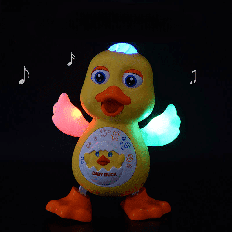 Rățușcă galbenă LUDIRO fotografiată pe fundal întunecat, cu aripile și partea superioară a capului luminate.