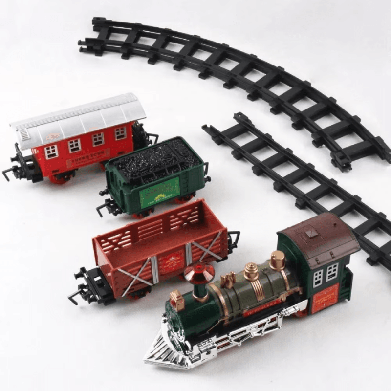 LUDIRO – Locomotiva și cele trei vagoane lângă segmentele de șină